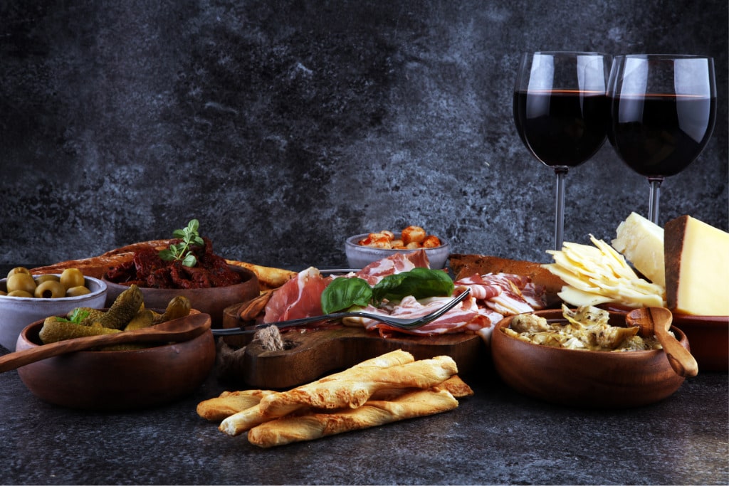 italian-antipasti-wine-snacks-set-cheese-variety-mediterranean-olives-picture-id984116790.jpg